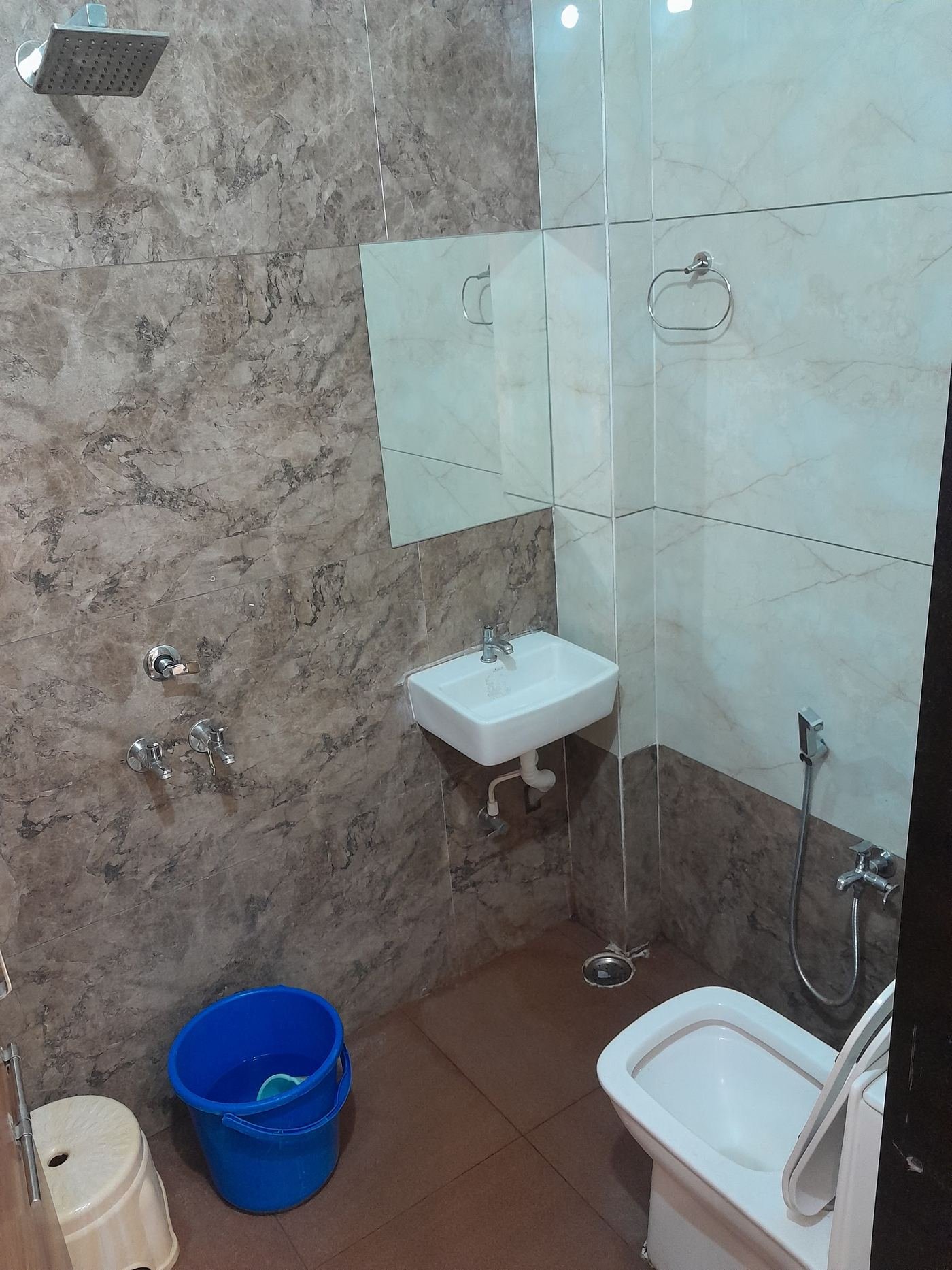 Attached bathroom with shower and fittings