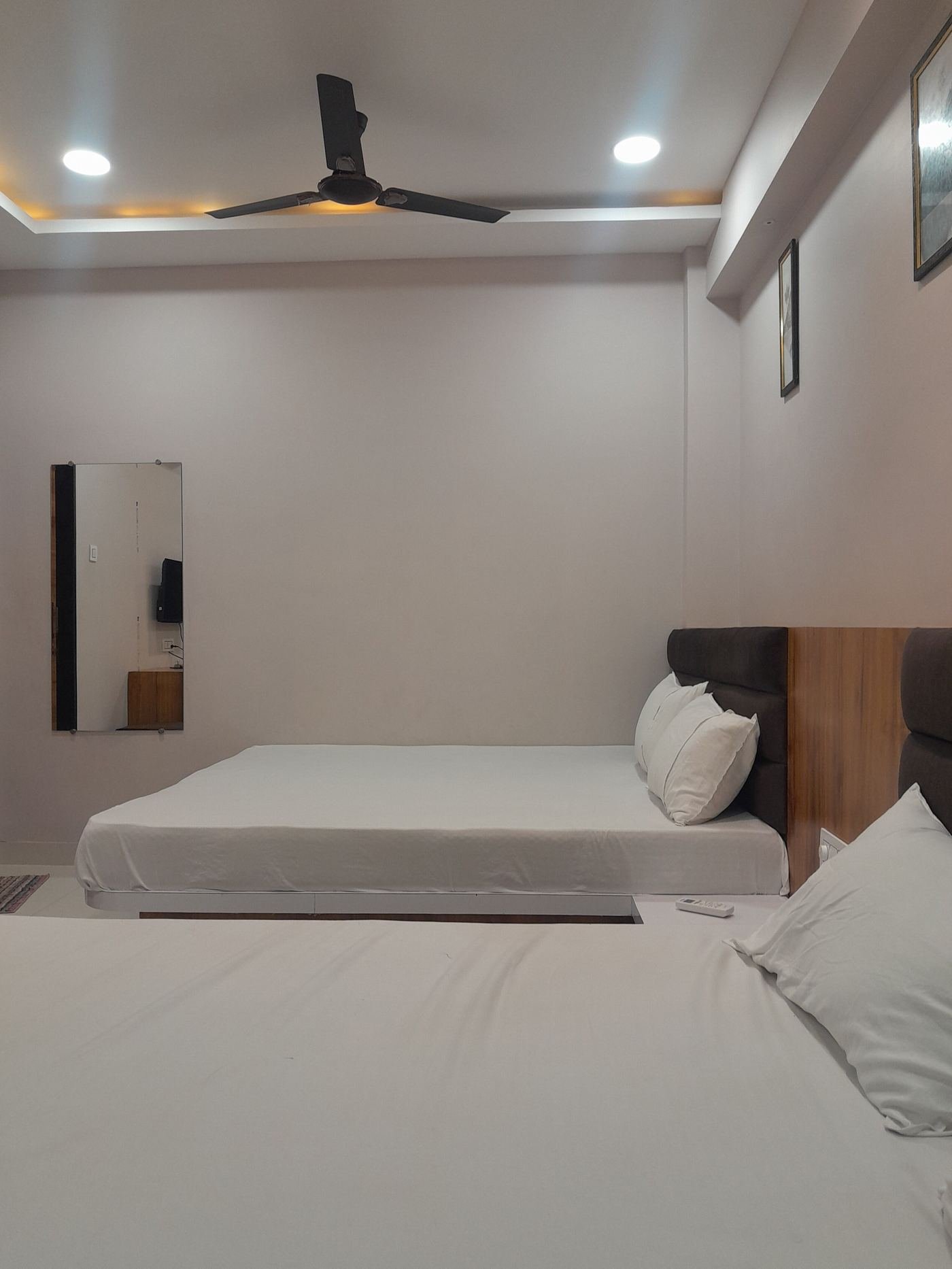 Wide view of hotel room interior