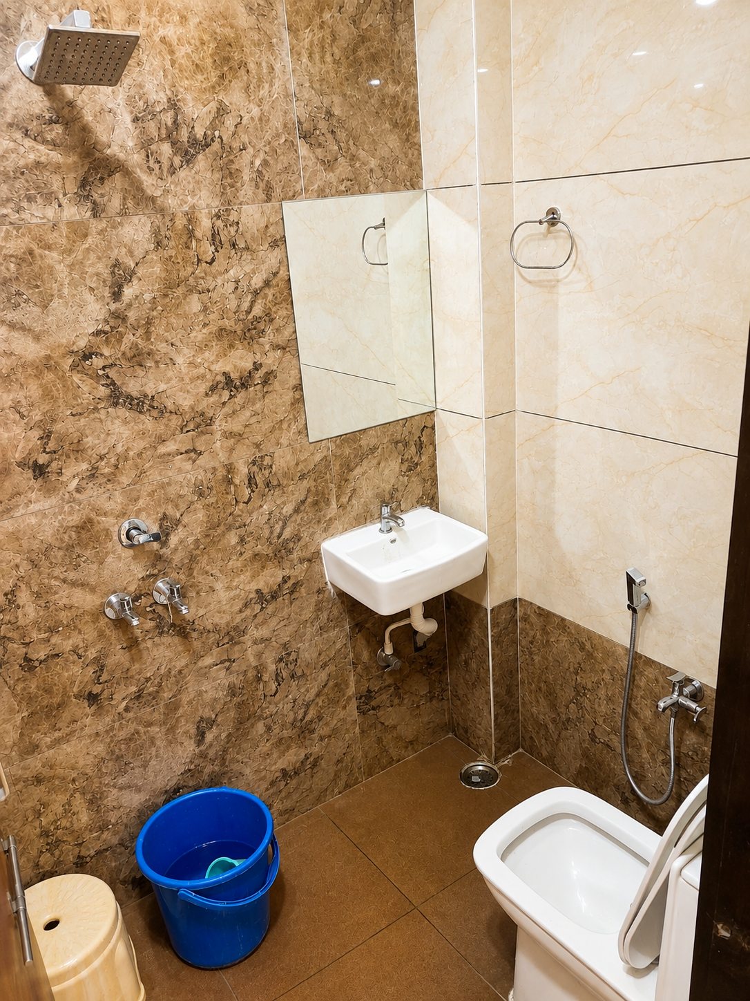 Attached washroom with western toilet and shower