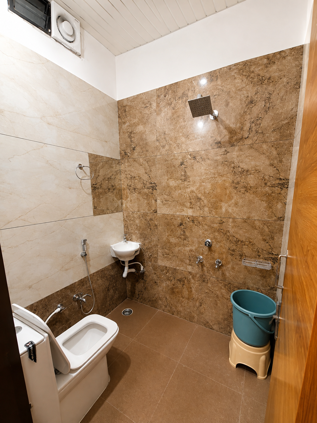 Clean attached bathroom in four bed room